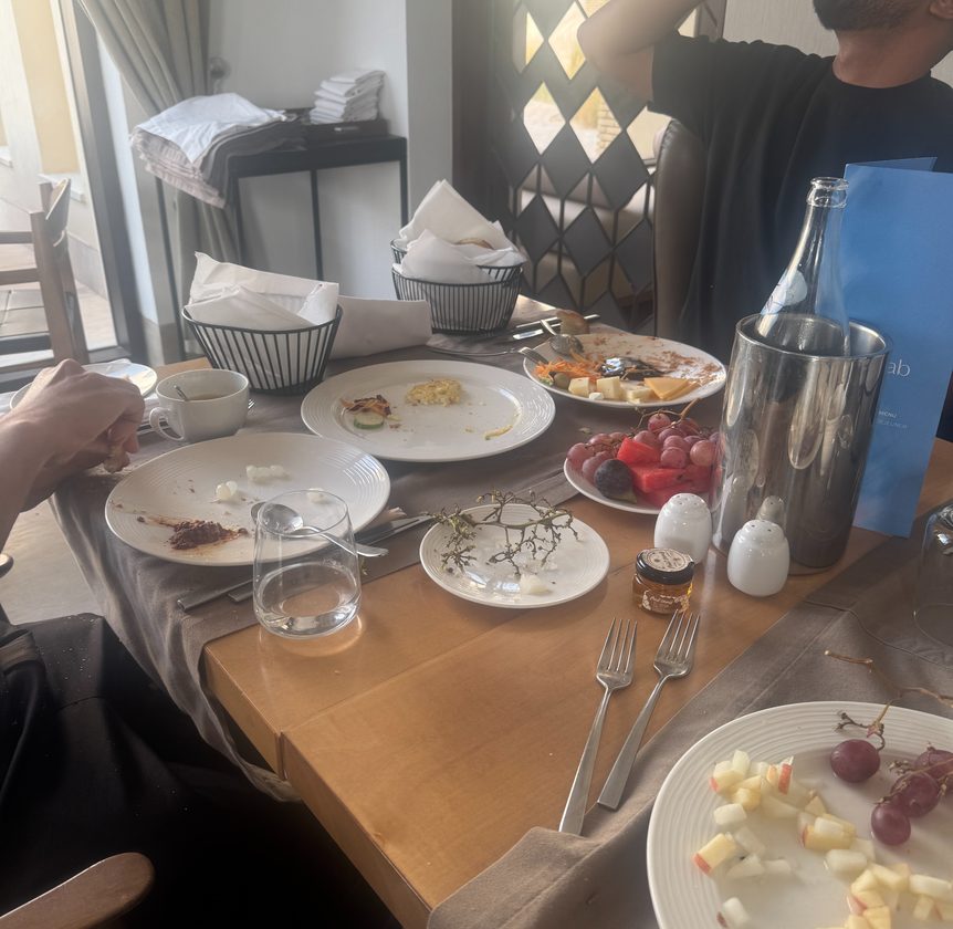 A breakfast table just after the meal